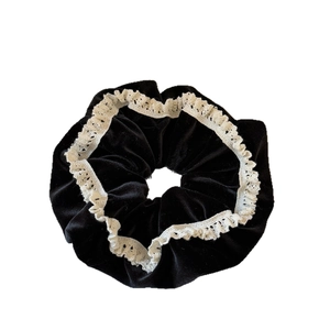 Elegant black velvet scrunchie with white lace trim, vintage style hair accessory for women