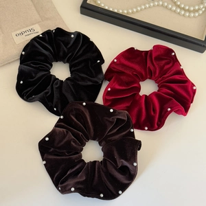 Three-piece set of velvet scrunchies with white pearls in black, burgundy and coffee colors
