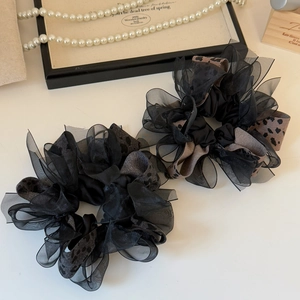 Elegant leopard print bow scrunchie set with black organza fabric for stylish hair styling
