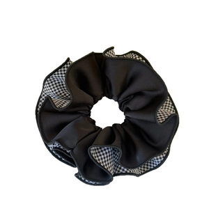 Classic black and white checkered oversized scrunchie with matte textured fabric