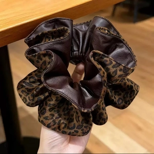 Fashionable leopard print and brown leather reversible oversized scrunchie for women