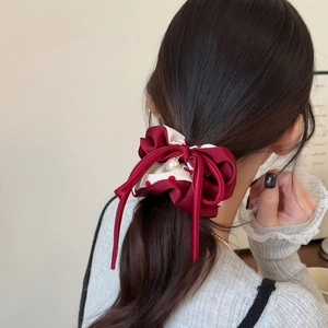 Vintage polka dot and wine red satin bow hair scrunchie with a central pearl detail