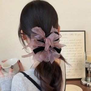 Barrette à cheveux élégante avec nœud en organza violet et velours noir à pois