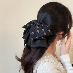 Elegante fermaglio per capelli a fiocco nero con motivo a ciliegia su tessuto testurizzato