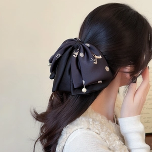 Elegant black satin bow hair clip with pearl charms and horse pattern for women