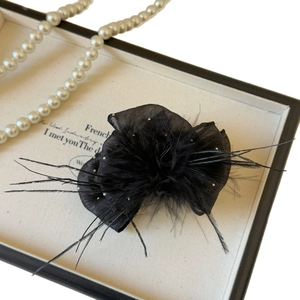 Elegant black feather hair claw with tulle and rhinestones for French vintage hairstyle