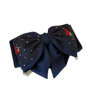 Elegant navy blue bow hair claw clip with cherry embroidery and white polka dots