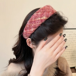 Pink plaid tweed headband with elegant wide brim design for a retro winter look