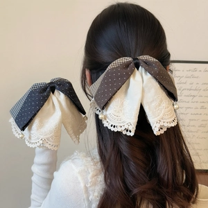 French lace bow hair clip and matching lace cuffs with pearls for elegant styling