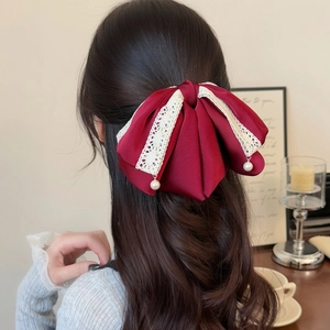 Elegant burgundy ribbon hair claw with white lace and pearl pendants for women