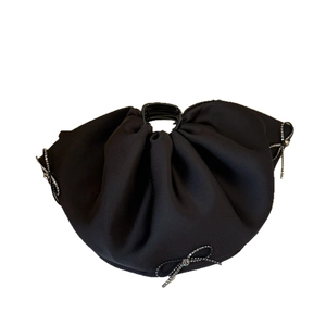 Elegant black satin pleated ribbon hair claw clip featuring a sparkling rhinestone bow