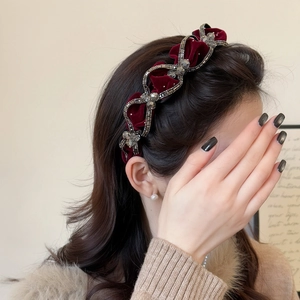 Padded burgundy velvet headband with sparkling diamond pattern and crystal embellishments