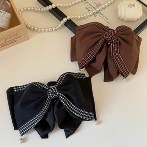 Elegant oversized bow hair claws in black and coffee brown with houndstooth and pearls