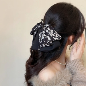 Pince à cheveux élégante en mousseline avec motif floral et nœud pour coiffure chic
