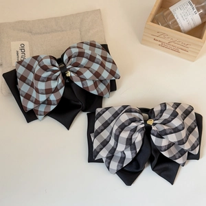 Elegant plaid bow hair claw clip with golden heart charm and minimalist diagonal stripes