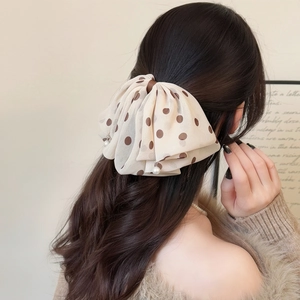 Polka dot mesh bow hair claw with pearl pendant for elegant ponytail styling