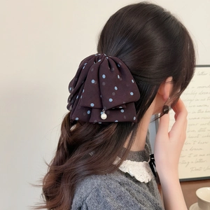 Polka dot mesh bow hair clip with pearl pendant for elegant ponytail styling