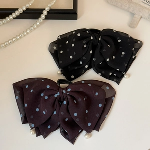 Elegant polka dot mesh bow hair clip with pearl pendant for a stylish ponytail look