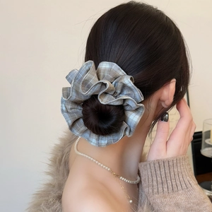 Retro plaid oversized scrunchie hair tie in blue-grey and brown check pattern