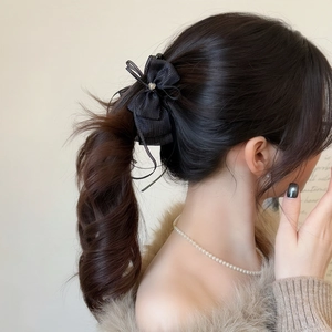 Elegante fermaglio per capelli a fiocco nero in rete luccicante con dettaglio in metallo