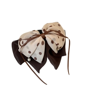 Elegant polka dot chiffon bow hair clip with dark brown ribbons and tiny pearl charms
