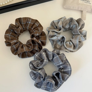 Three vintage plaid scrunchies in brown, blue and grey with elegant pearl necklace accent