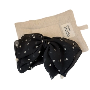 Elegant black polka dot mesh bow hair clip with pearls for vintage hairstyles