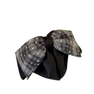French style black fabric hair claw clip with a grey checkered bow for elegant ponytails