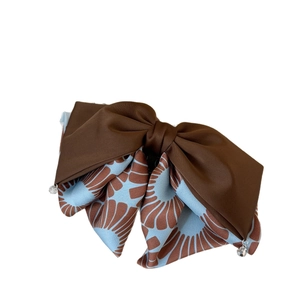 Elegant large double-layered hair clip with brown solid and blue floral pattern fabric