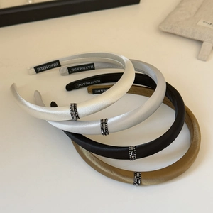 Elegant satin padded headbands with rhinestone buckle and handmade label in assorted colors