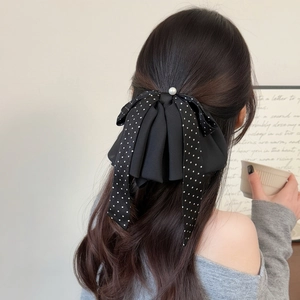 Pince à cheveux élégante à nœud noir avec pois blancs et perle pour femme