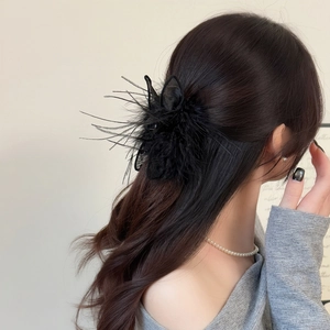 Elegant black feather hair claw clip with mesh details for women hair styling