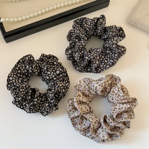 Three-piece floral fabric hair scrunchies set in black, brown and cream colors