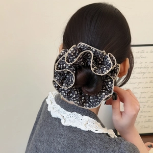 Large vintage floral scrunchie with white flower patterns and elegant ruffled edges