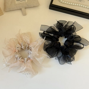 Chouchous étincelants en organza à pois champagne et noirs pour coiffures élégantes