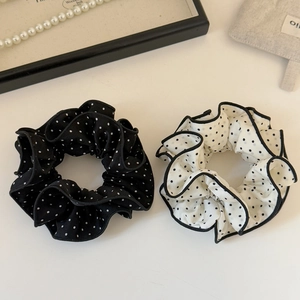 Chic black and white polka dot scrunchies set with elegant pearl necklace accents