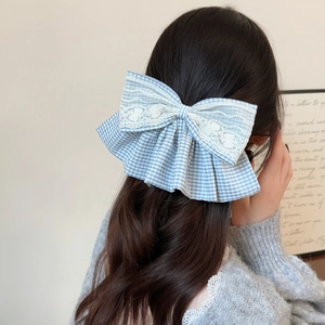 Pince à cheveux avec nœud en dentelle à carreaux bleus pour coiffure élégante femme