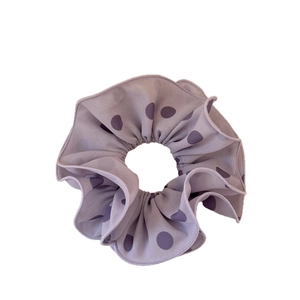 Lavender purple polka dot hair scrunchie with layered fabric and ruffled design