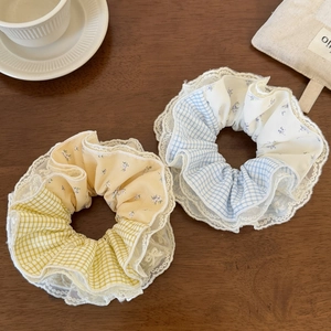 Set of two pastel yellow and blue plaid scrunchies with floral chiffon and lace edges