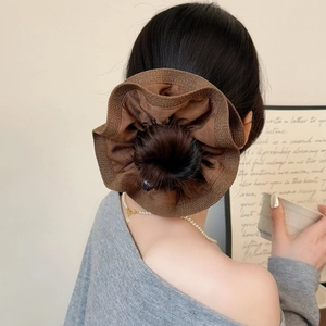 Elegant layered brown pleated scrunchie with a subtle metallic sheen for hair styling