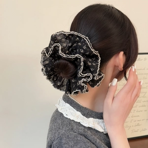 Floral chiffon scrunchie with lace trim edges and stylish black and white contrast