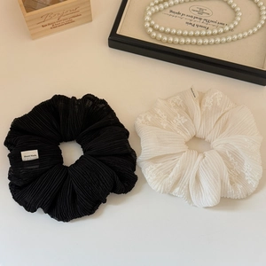 Elegant set of black pleated and white lace embroidered scrunchies with handmade tags