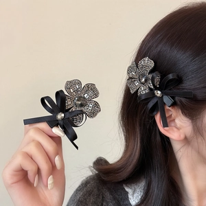Elegant black ribbon bow hair clips with sparkling rhinestone flowers for women
