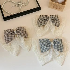 Lace plaid bow hair clips with pearls shown in three colors from a 45-degree angle