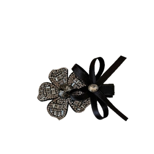 Elegant flower hair clip with sparkling grey rhinestones and black satin bow detail