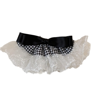 Barrette à motif pied-de-poule avec nœud en satin noir et bordure en dentelle blanche