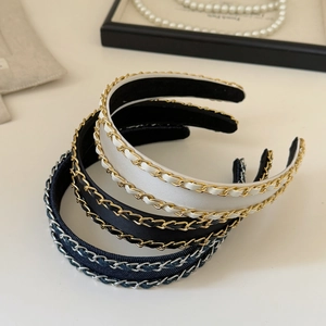Detail of elegant chain woven headbands in satin and denim with anti-slip lining design