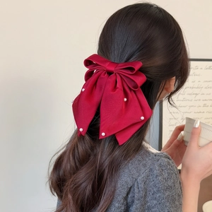 Elegant deep red satin bow hair clip with white pearls for women's hairstyle