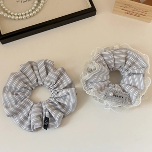 Striped scrunchie set with lace edges and pearl detail for elegant hairstyles