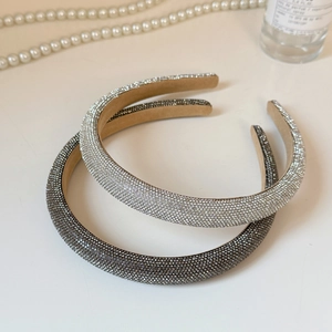 Elegant thin headbands with shiny rhinestones in silver and dark grey for a luxury look